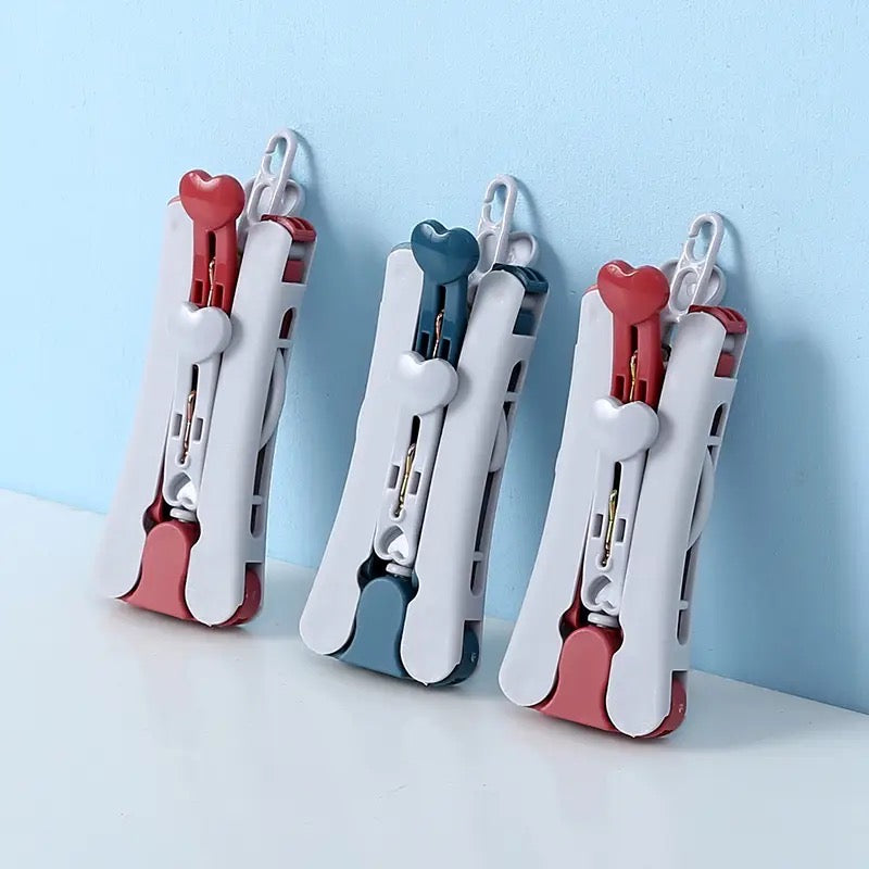 FOLDING WIND-PROOF CLOTH HANGER