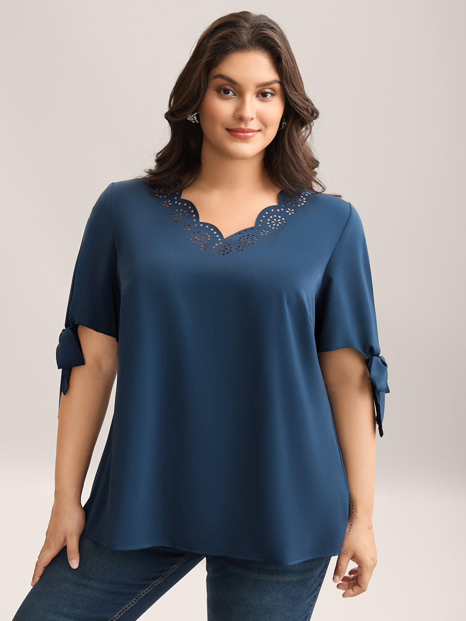 Laser Cut Neckline Knotted Sleeve Blouse