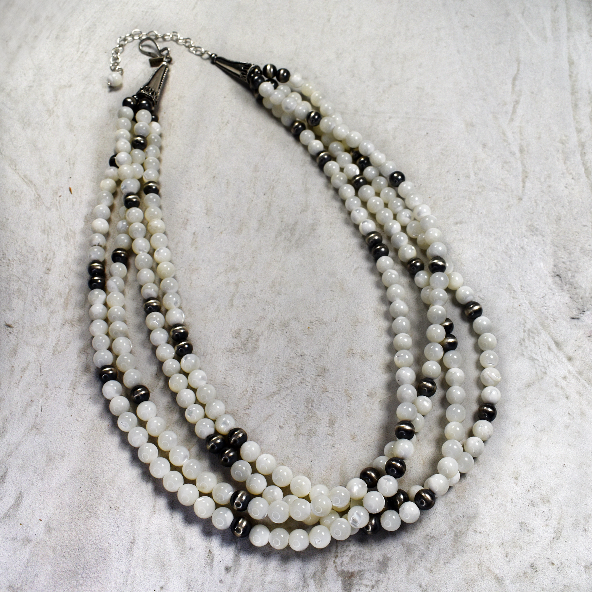 22 Mother of Pearl and Sterling Silver Four Strand Necklace