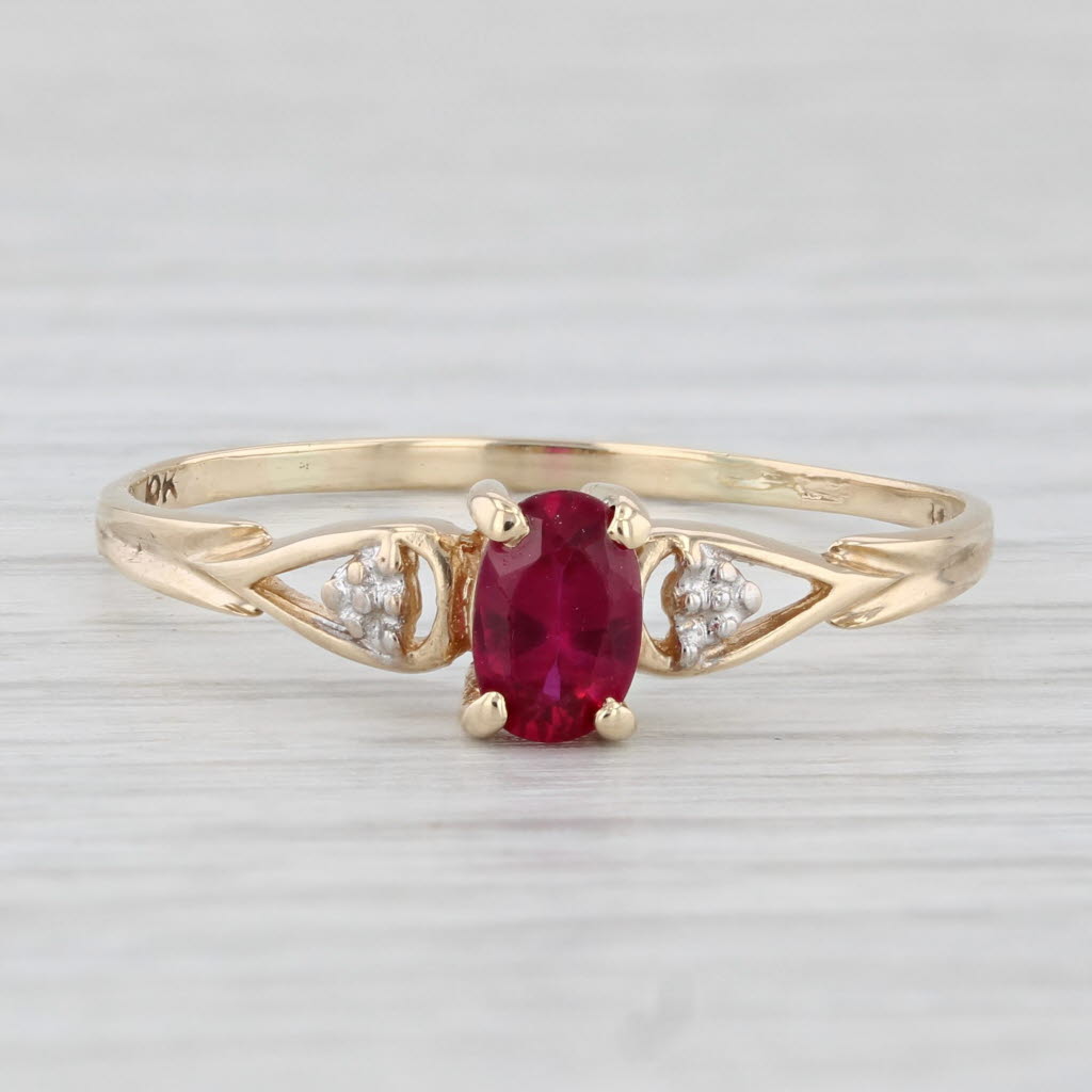 0.50ctw Oval Lab Created Ruby Ring 10k Yellow Gold Size 10.75