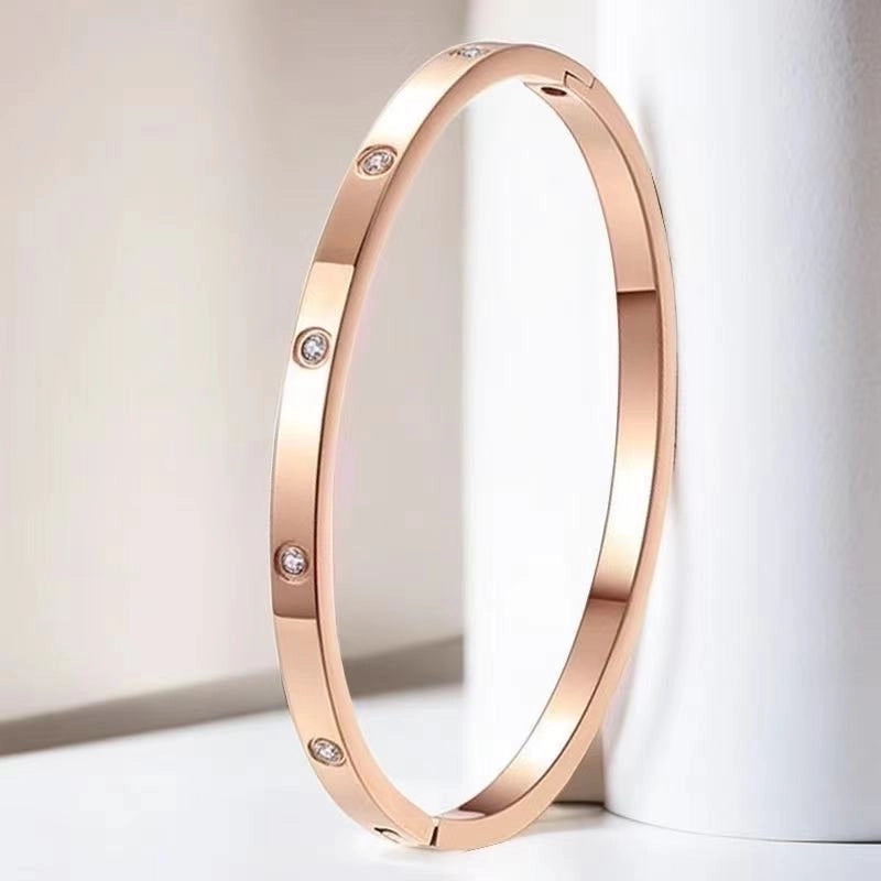 Retro Round Titanium Steel Inlay Zircon Bangle