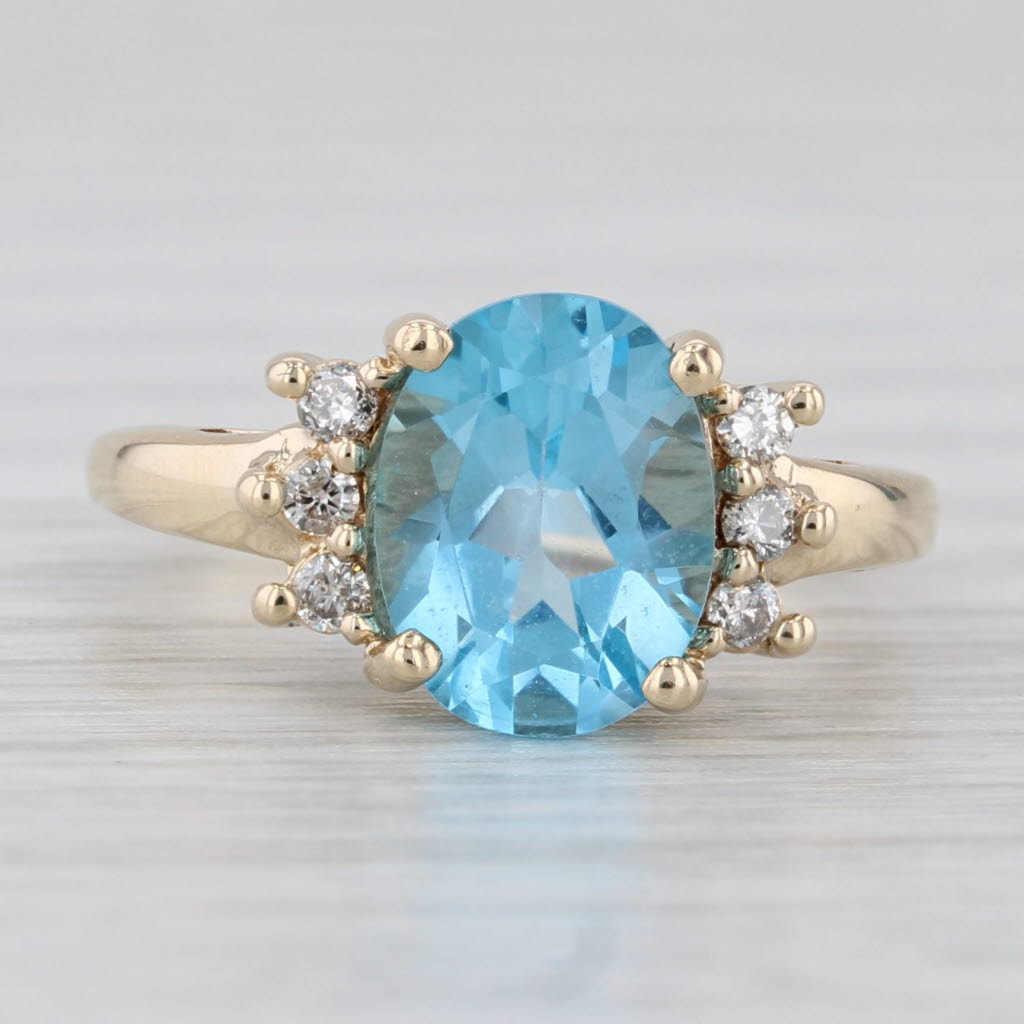 2.19ctw Oval Blue Topaz Diamond Ring 10k Yellow Gold Size 4.5