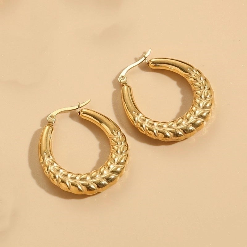 1 Pair Elegant Classic Style Stripe Oval Twist Hollow Out 304 Stainless Steel Earrings