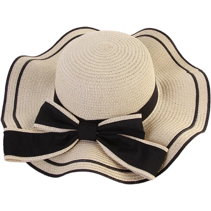 Women's Elegant Pastoral Minimalist Waves Bowknot Big Eaves Straw Hat