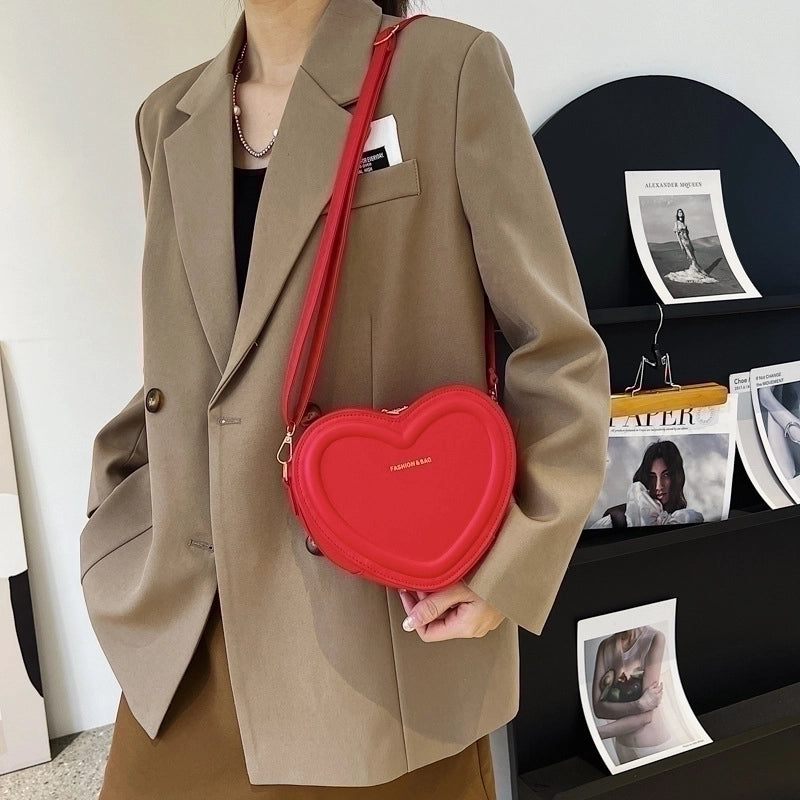 Women's Small Pu Leather Solid Color Fashion Heart-shaped Zipper Crossbody Bag