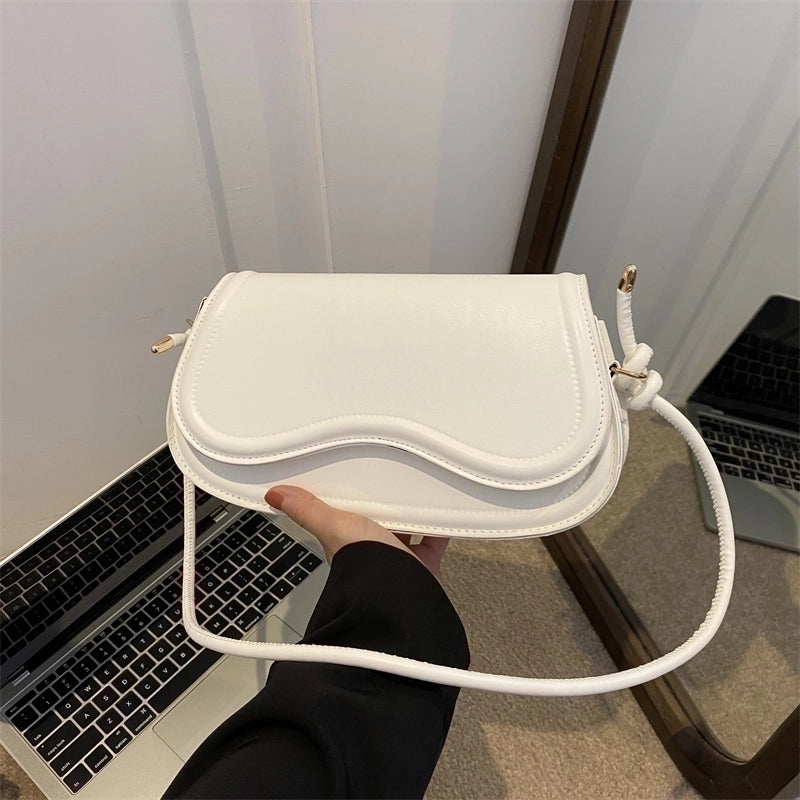 Women's Pu Leather Solid Color Streetwear Oval Flip Cover Shoulder Bag