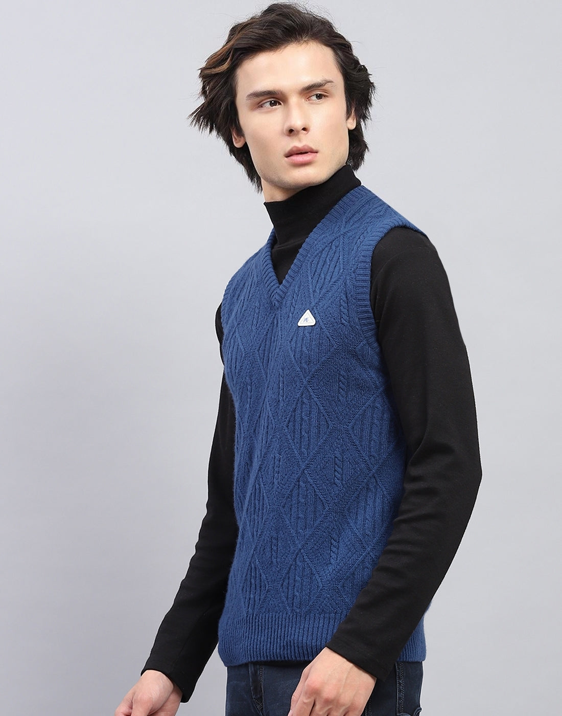 Men Blue Self Design V Neck Sleeveless Sweater