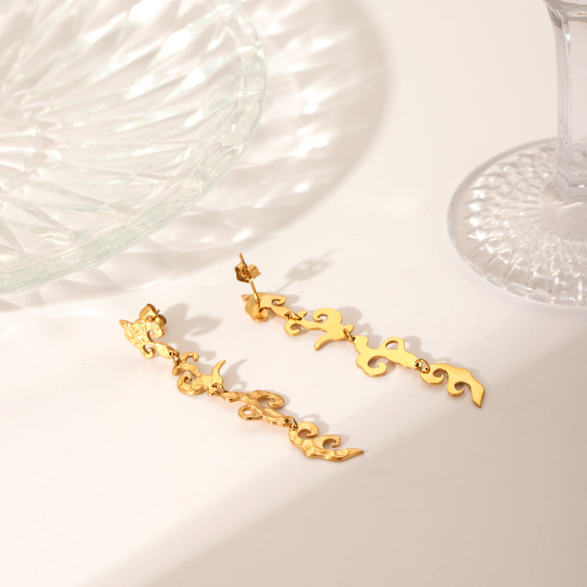 Stainless Steel Earrings Niche Design Hammer Pattern Flame Tassel Earrings Female Earrings