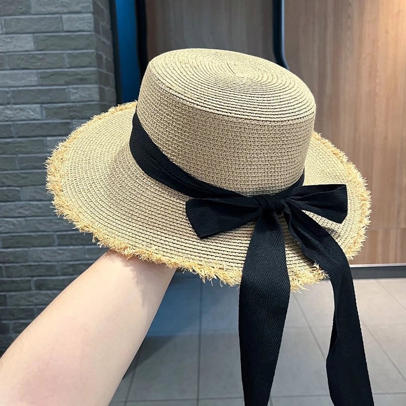 Women's Sweet Pastoral Solid Color Bowknot Wide Eaves Straw Hat