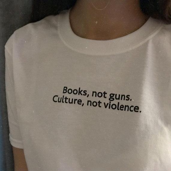 Books Not Guns Culture Not Violence  Tee