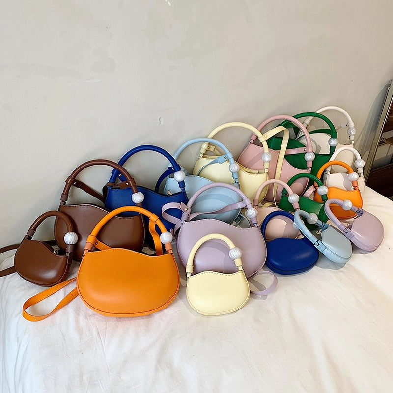 Unisex Medium Pu Leather Solid Color Vintage Style Streetwear Dumpling Shape Zipper Crossbody Bag