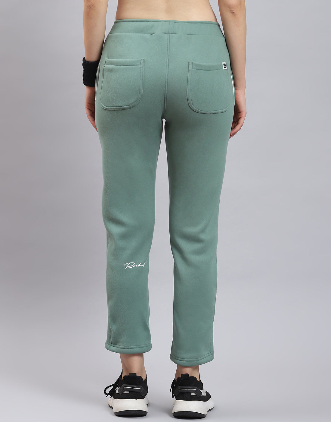 Women Green Solid Regular Fit Winter Lower