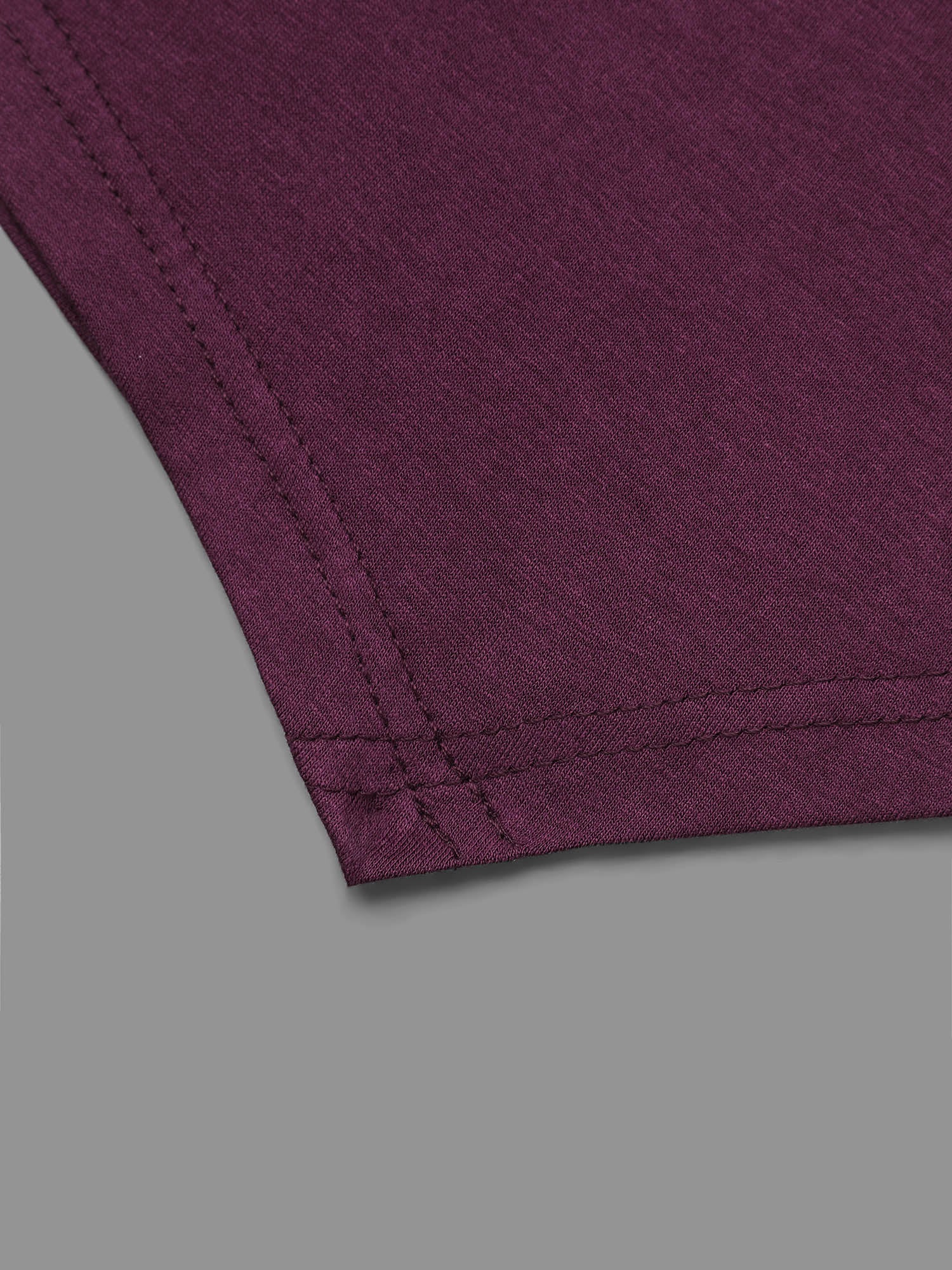 Solid Button Detail Asymmetrical Hem Jersey Top
