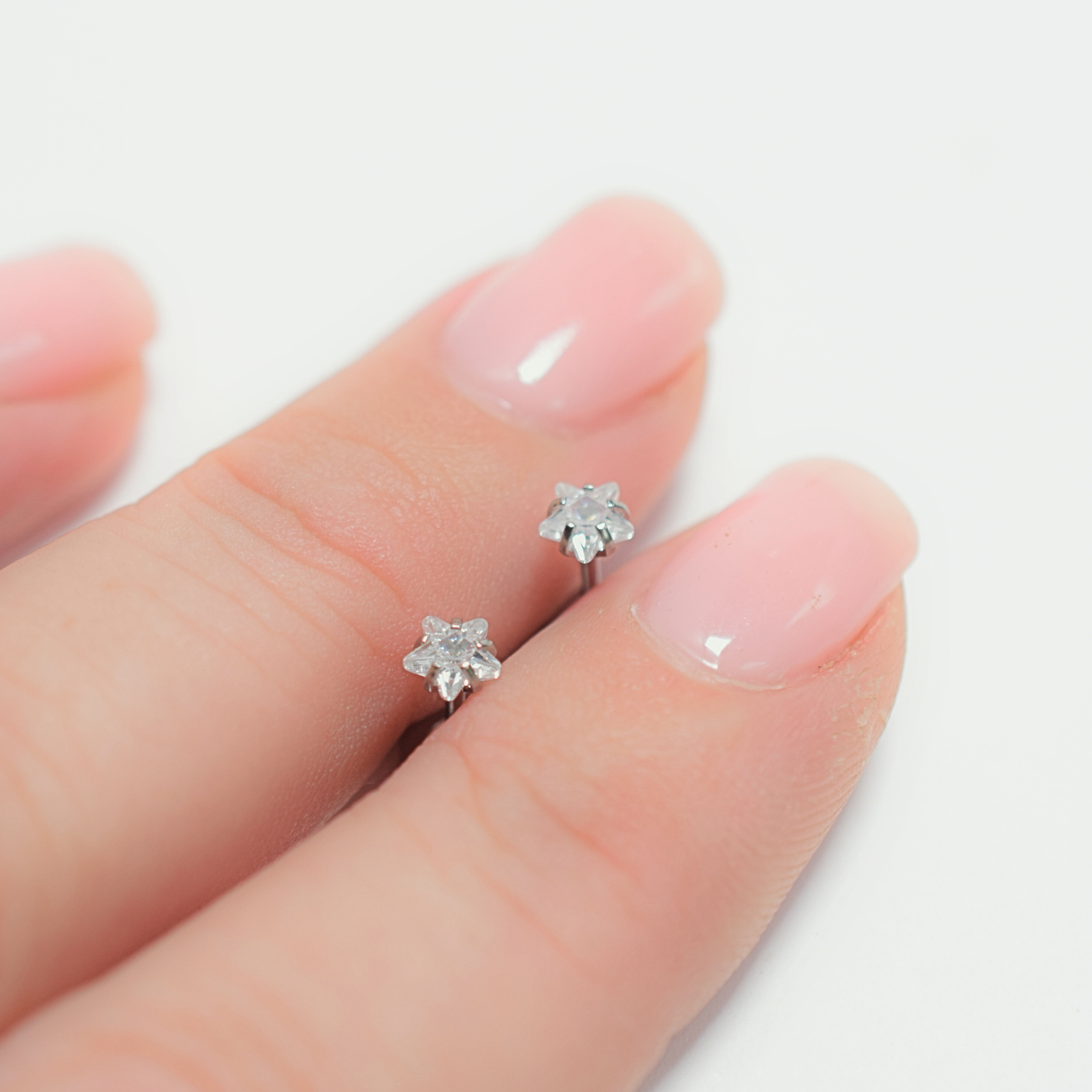 Baby Diamond star studs - Silver