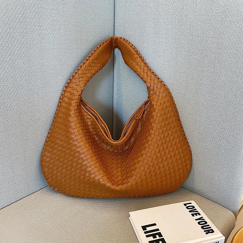 Women's Medium Pu Leather Solid Color Streetwear Weave Dumpling Shape Zipper Handbag
