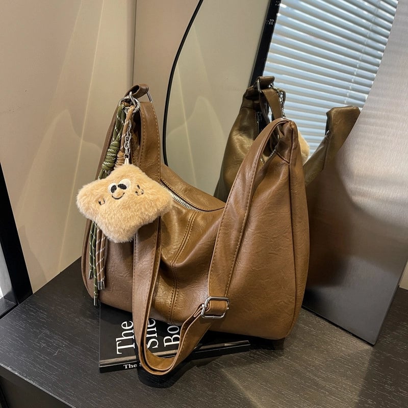 Women's Large PU Solid Color Elegant Ethnic Style Sewing Thread Dumpling Shape Zipper Shoulder Bag