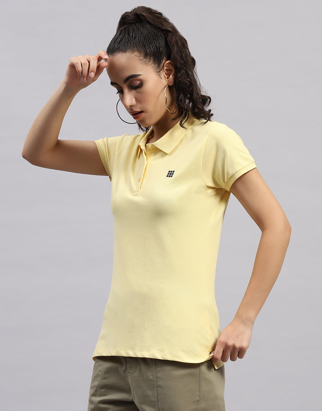 Women Yellow Solid Polo Collar Half Sleeve T Shirt