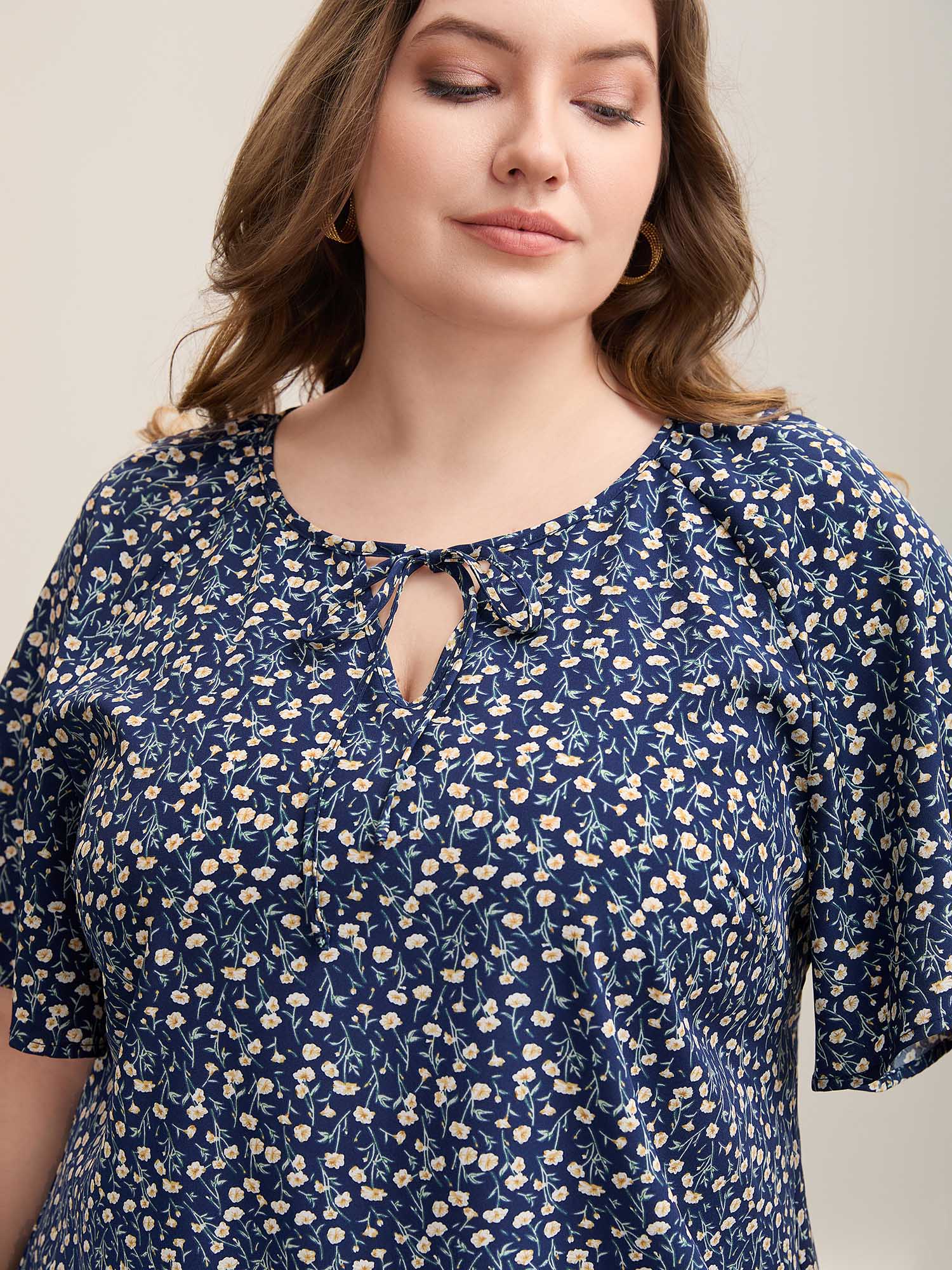Floral Printed Lotus Sleeve Tied Blouse