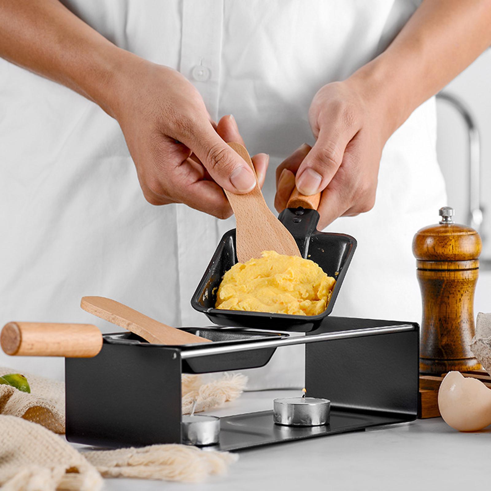 Mini-Käse-Raclette-Ofen. abnehmbares Zubehör für das Backen im Restaurant