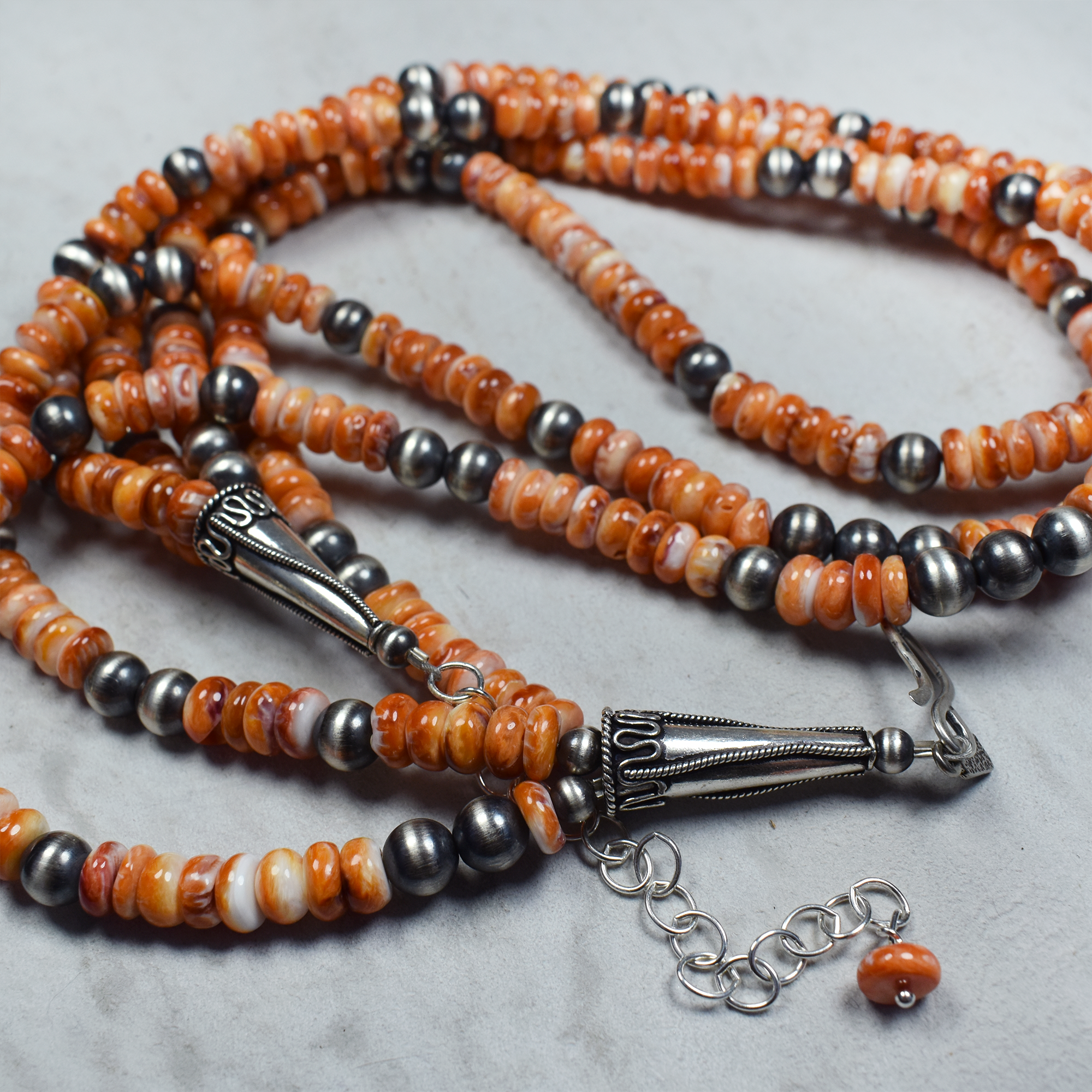 22 Spiny Oyster and Sterling Silver Three Strand Necklace