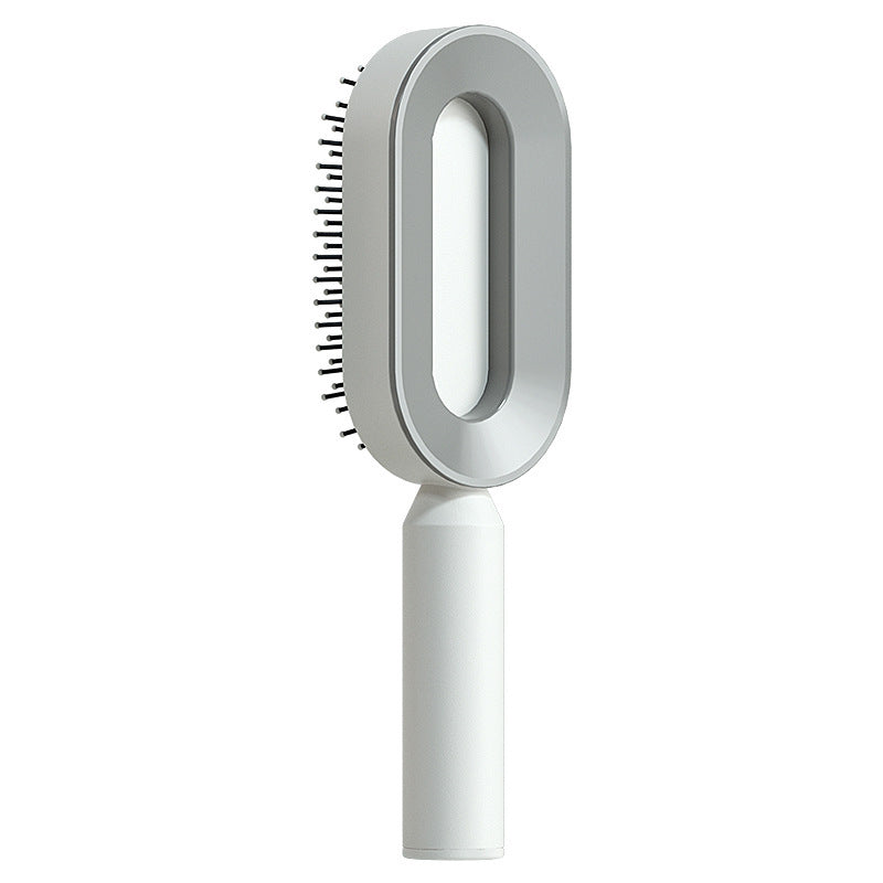 Self-cleaning hairbrush for women. One-button cleaning airbag to prevent hair loss