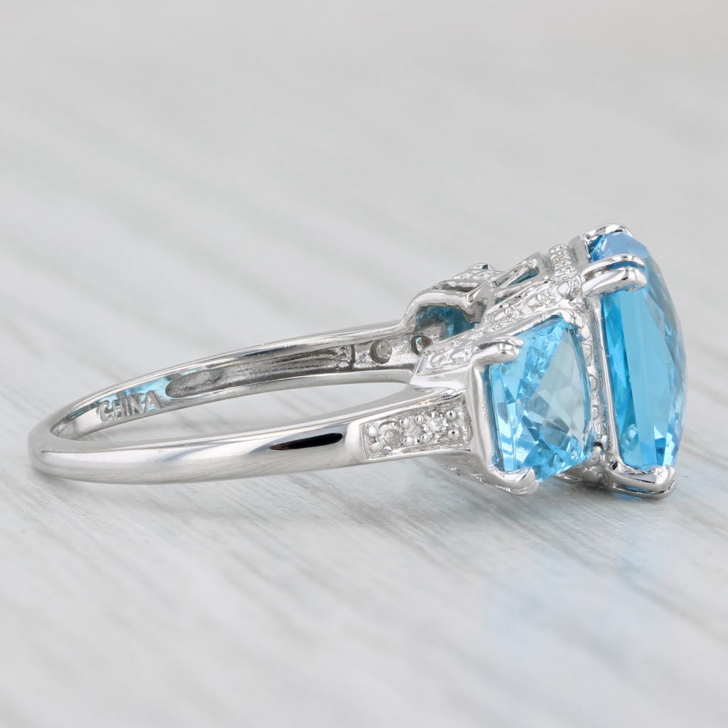 6.37ctw Blue Topaz 3-Stone Ring 10k White Gold Size 7 Diamond Accents