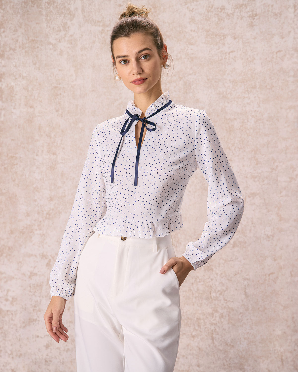 The White Mock Neck Polka Dot Ruffle Blouse