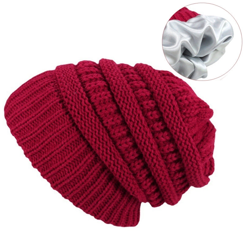 Autumn And Winter Solid Color Knitted Warm Ear Protection Hat Satin Lining Wool Cap Cap Cap Manufacturers Selling