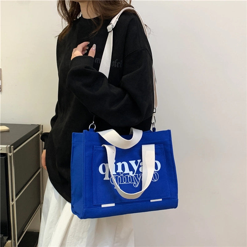 Women's All Seasons Canvas Letter Solid Color Preppy Style Classic Style Sewing Thread Square Hidden Buckle Shoulder Bag Canvas Bag Handbag
