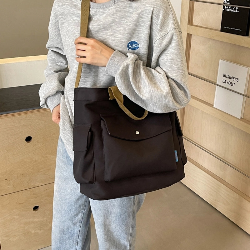 Women's Medium Cloth Solid Color Preppy Style Classic Style Sewing Thread Zipper Crossbody Bag
