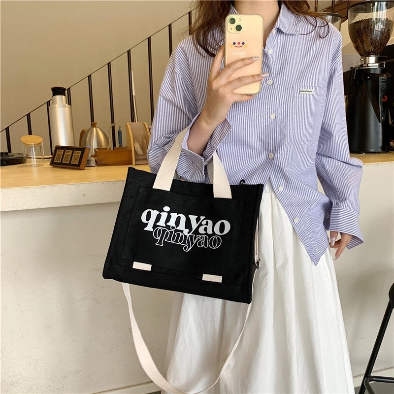 Women's All Seasons Canvas Letter Solid Color Preppy Style Classic Style Sewing Thread Square Hidden Buckle Shoulder Bag Canvas Bag Handbag