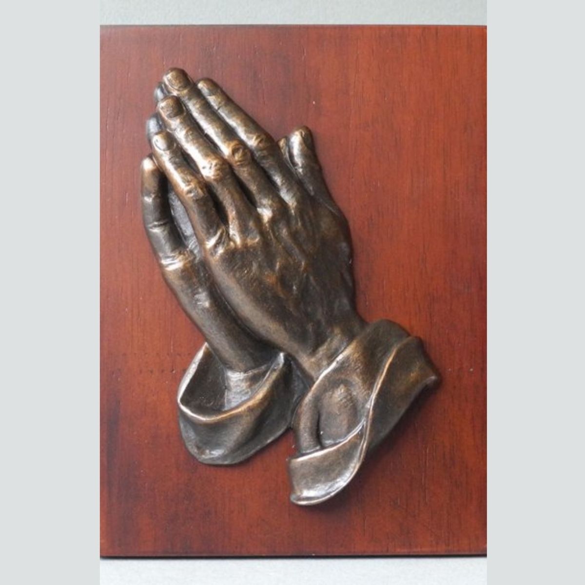 Praying Hands On Wood Panel