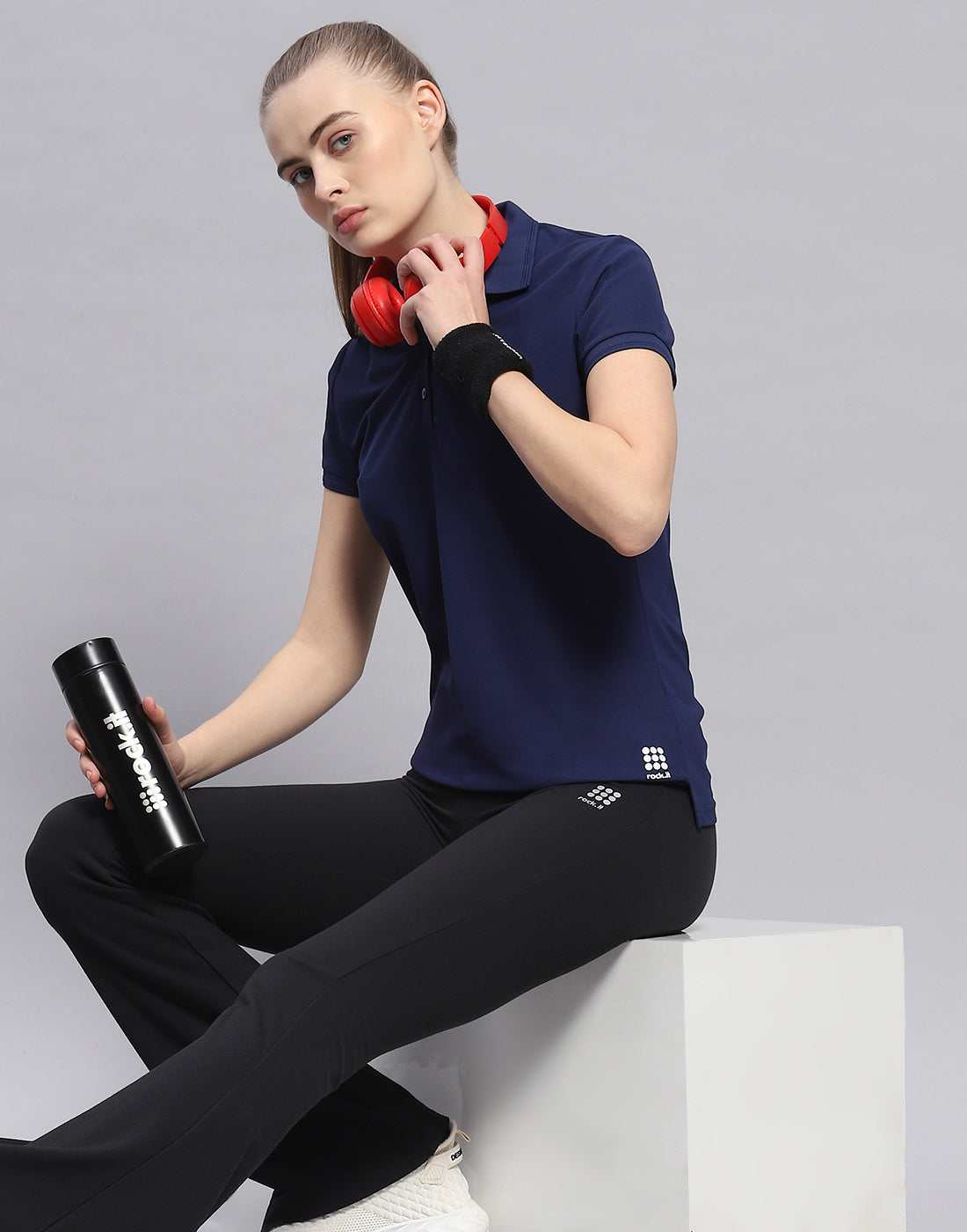 Women Navy Blue Solid Polo Collar Half Sleeve T-Shirt