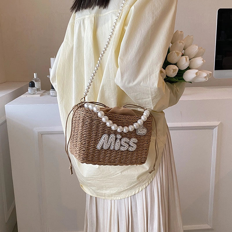 Women's Medium Straw Letter Solid Color Vacation Beach Beading Weave String Straw Bag
