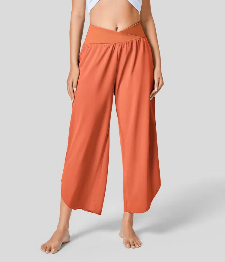 Breezeful™ crossover pants with high waistband and pleated side pockets