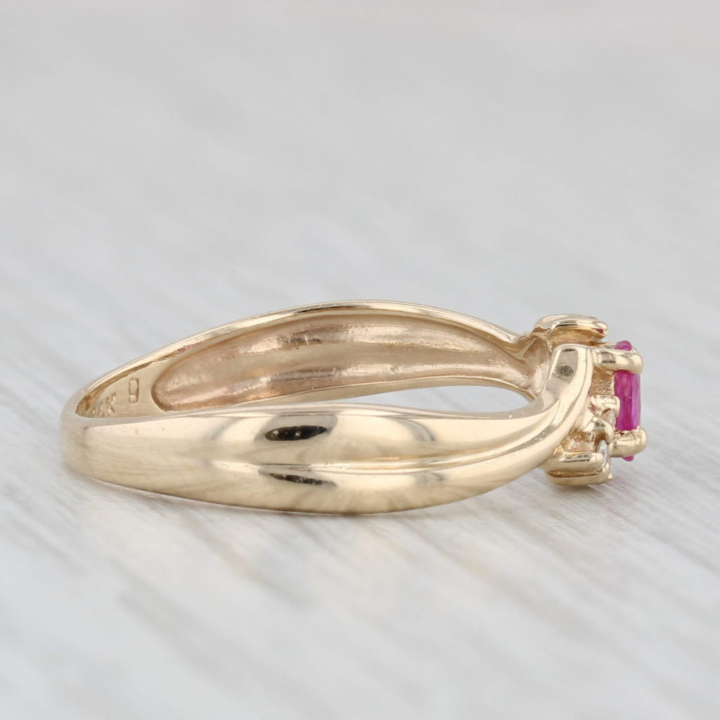 0.28ctw Oval Pink Sapphire Cubic Zirconia Ring 14k Yellow Gold Size 4.75