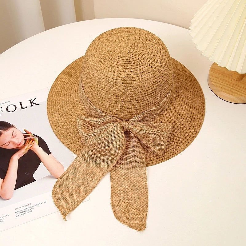 Women's Sweet Pastoral Solid Color Bowknot Wide Eaves Straw Hat