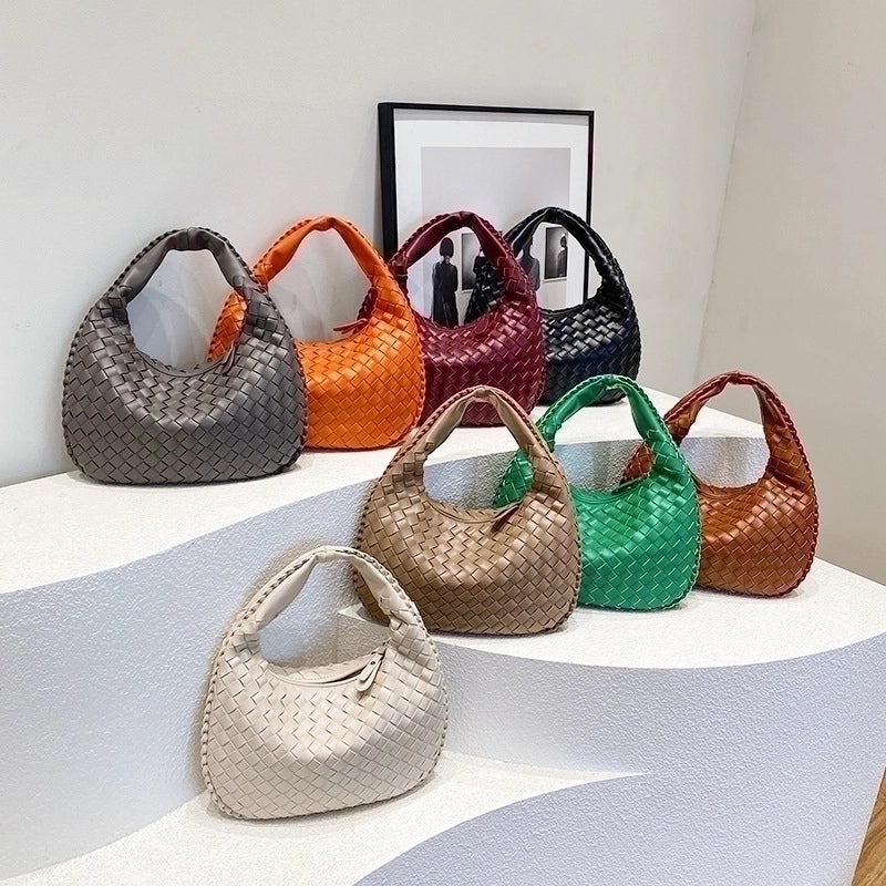 Women's Medium Pu Leather Solid Color Streetwear Weave Dumpling Shape Zipper Handbag