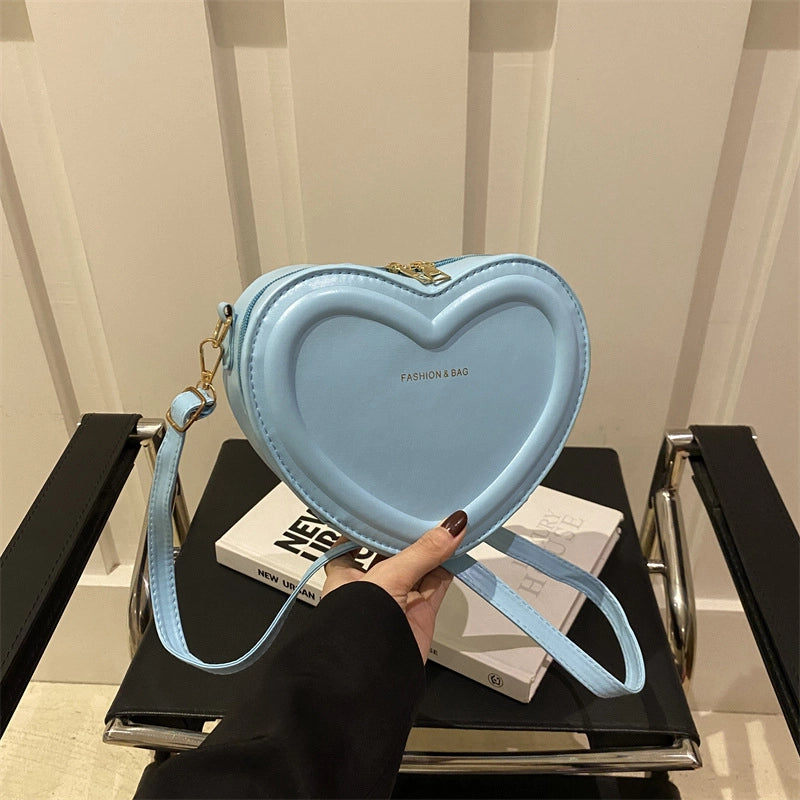 Women's Pu Leather Solid Color Cute Sewing Thread Heart-shaped Zipper Crossbody Bag
