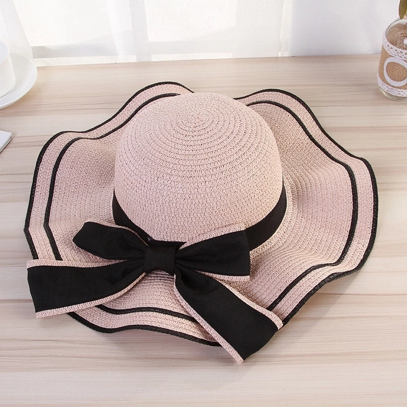 Women's Elegant Pastoral Minimalist Waves Bowknot Big Eaves Straw Hat