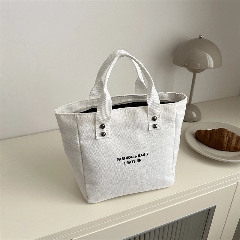 Women's Medium Canvas Letter Solid Color Basic Classic Style Zipper Handbag
