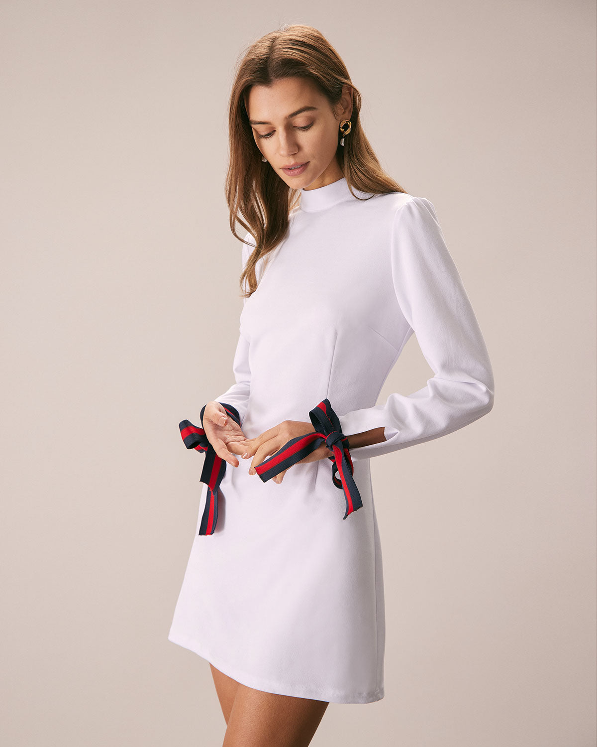 The White Mock Neck Bowknot Cuff Mini Dress