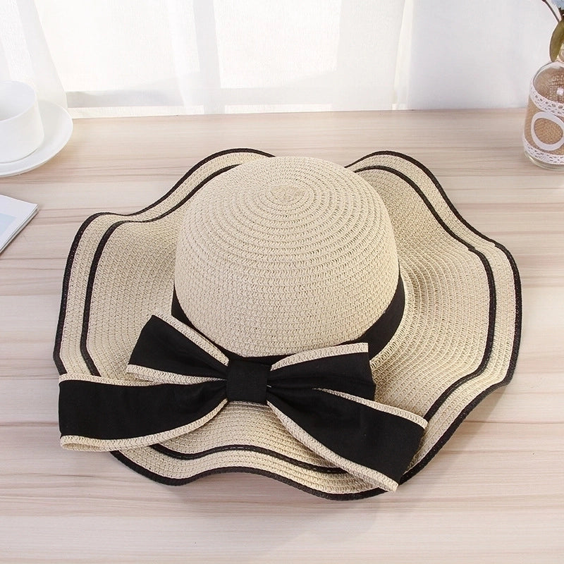 Women's Elegant Pastoral Minimalist Waves Bowknot Big Eaves Straw Hat