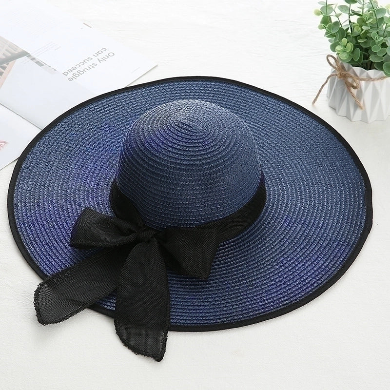 Women's Sweet Pastoral Solid Color Bowknot Big Eaves Straw Hat