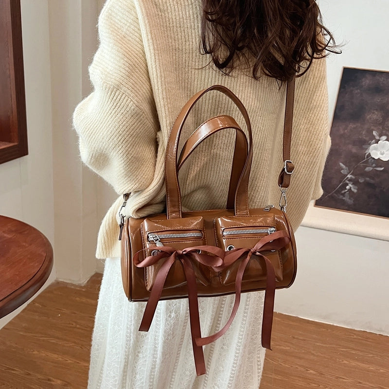 Women's Pu Leather Solid Color Bow Knot Classic Style Cylindrical Zipper Crossbody Bag