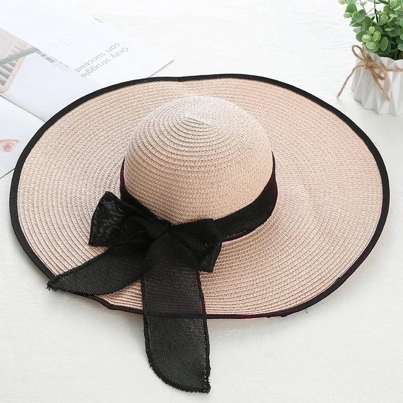 Women's Sweet Pastoral Solid Color Bowknot Big Eaves Straw Hat