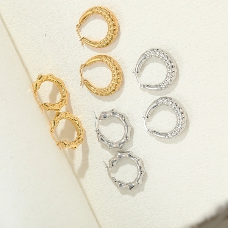 1 Pair Elegant Classic Style Stripe Oval Twist Hollow Out 304 Stainless Steel Earrings