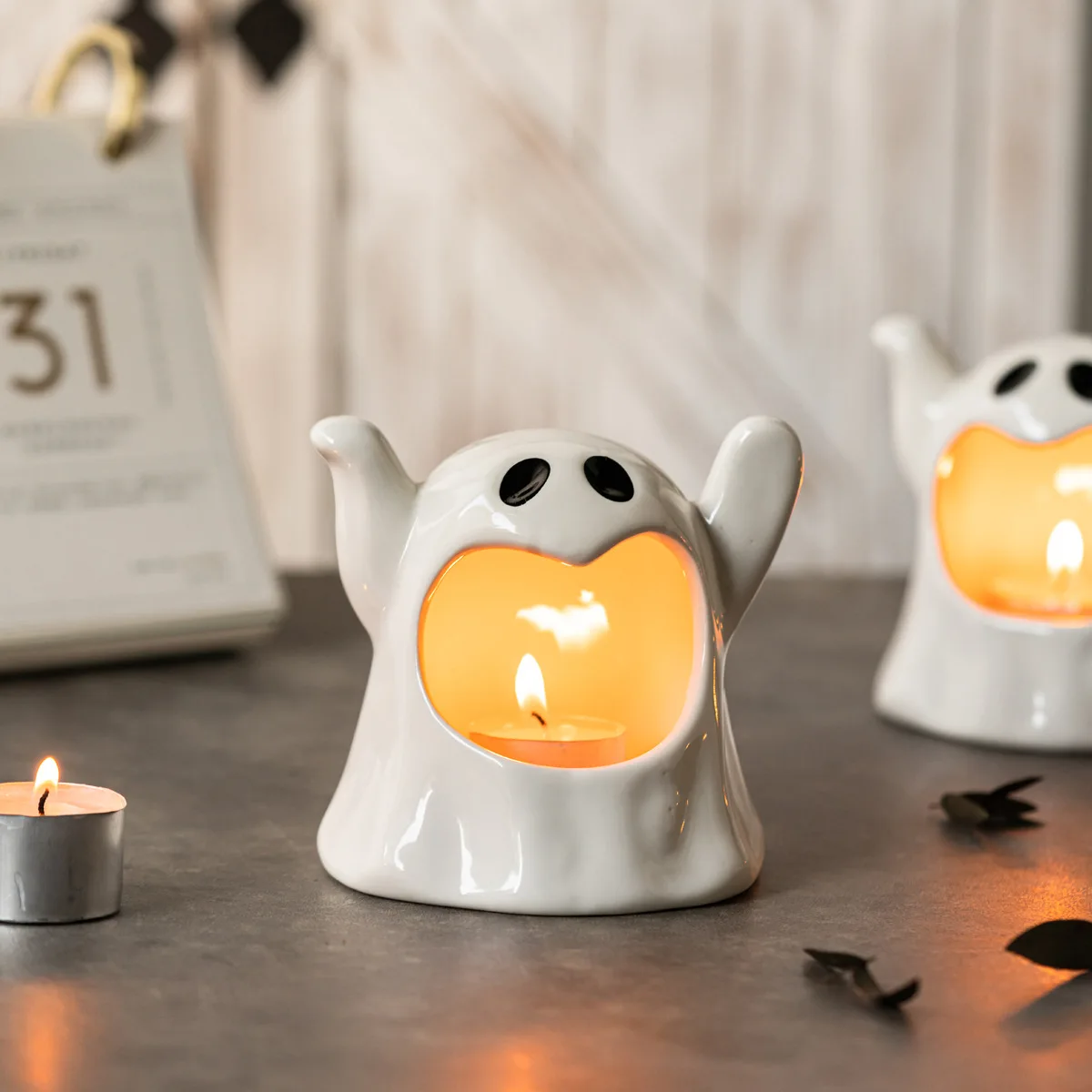 Halloween atmosphere ornaments with white ceramic ghosts for home decoration