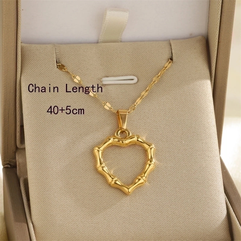 Minimalist Classic Style Sun Heart Shape Bow Knot 201 Stainless Steel 304 Stainless Steel Rhinestones Shell Zircon 18K Gold Plated Inlay Pendant Necklace