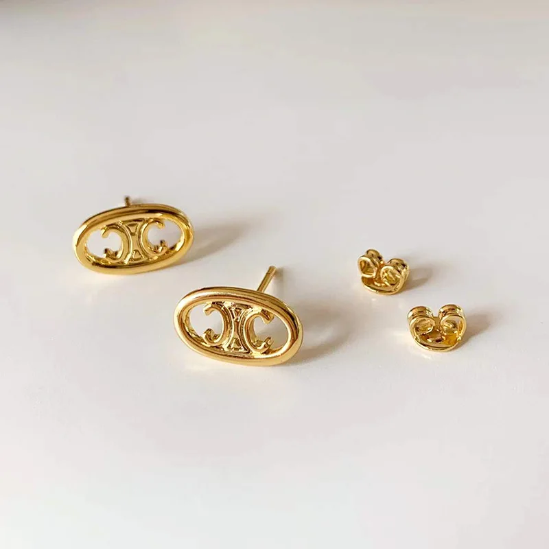 female delicate small Gold plated copper alloy hollowing triumphal arch stud earrings